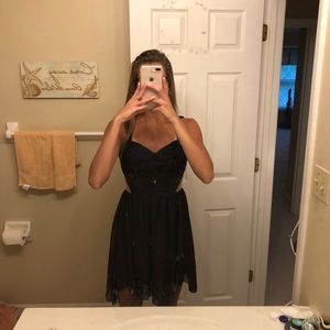 Black dress with mesh sides and back